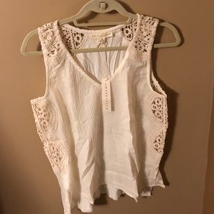 Lovestitch off white crochet lace tank size medium never been worn with tags.